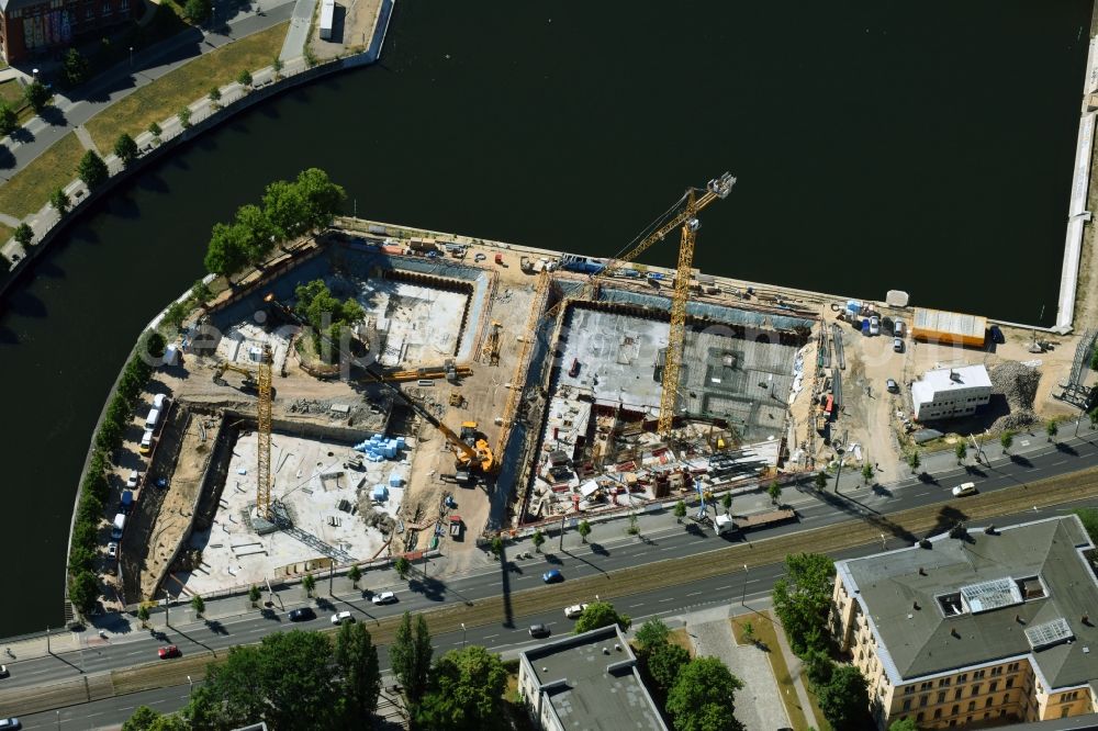 Berlin from above - Construction site to build a new multi-family residential complex on Invalidenstrasse on Humboldthafen in the district Moabit in Berlin, Germany