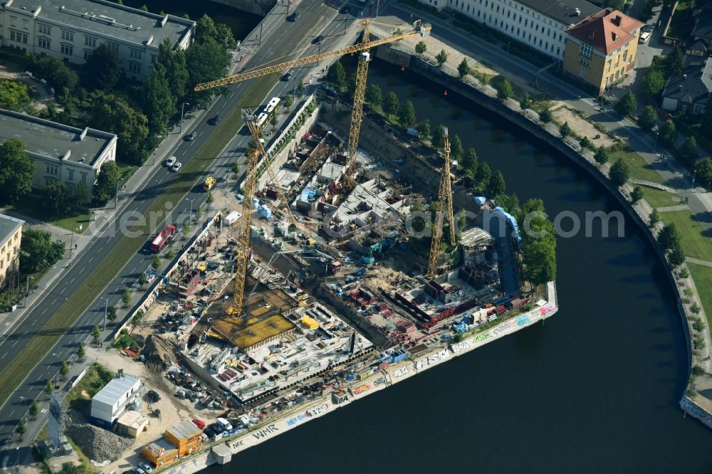 Berlin from above - Construction site to build a new multi-family residential complex on Invalidenstrasse on Humboldthafen in the district Moabit in Berlin, Germany