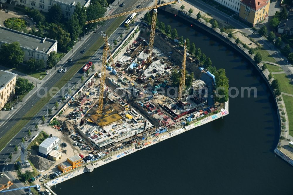 Berlin from the bird's eye view: Construction site to build a new multi-family residential complex on Invalidenstrasse on Humboldthafen in the district Moabit in Berlin, Germany