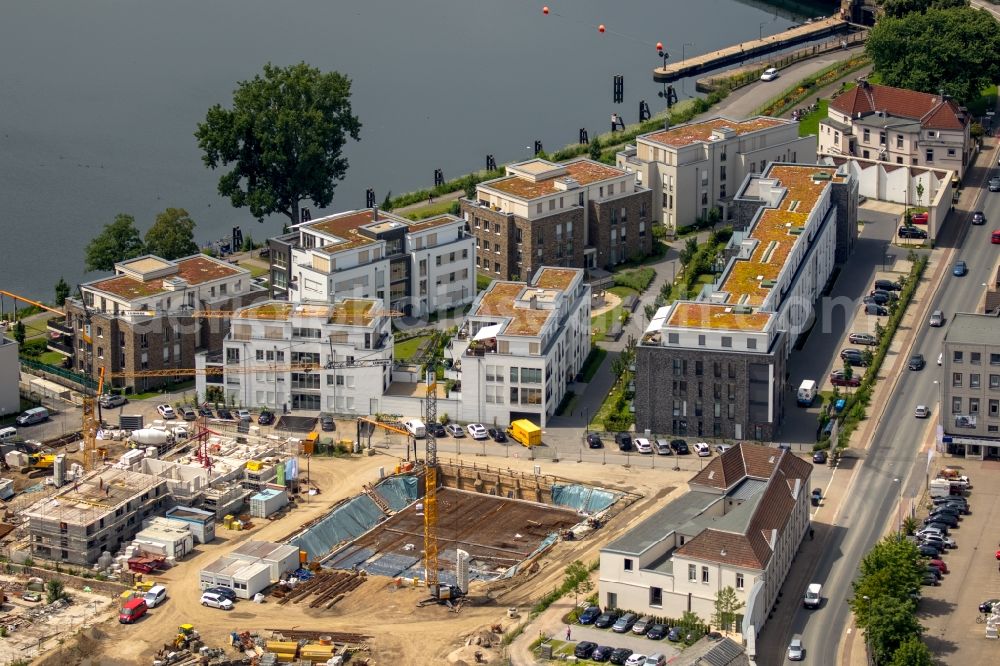 Aerial photograph Essen - Construction site to build a new multi-family residential complex on Kettwiger Seepromenade in Essen in the state North Rhine-Westphalia