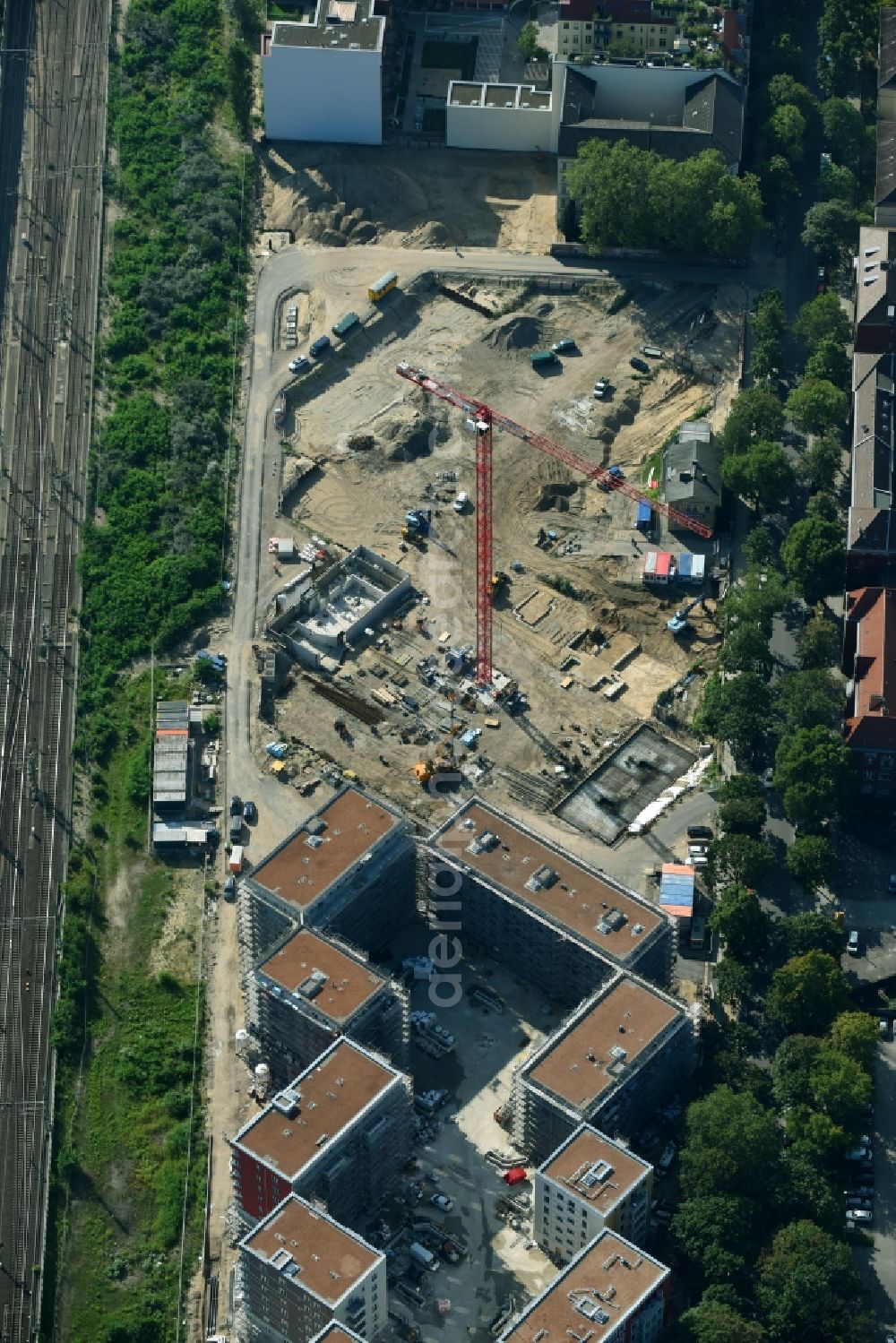 Berlin from the bird's eye view: Construction site to build a new multi-family residential complex Kruppstrasse - Lehrter Strasse in Berlin