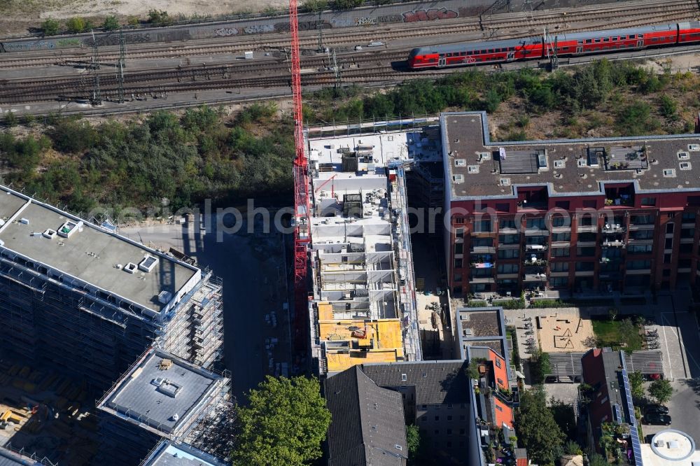 Berlin from above - Construction site to build a new multi-family residential complex Kruppstrasse - Lehrter Strasse in Berlin