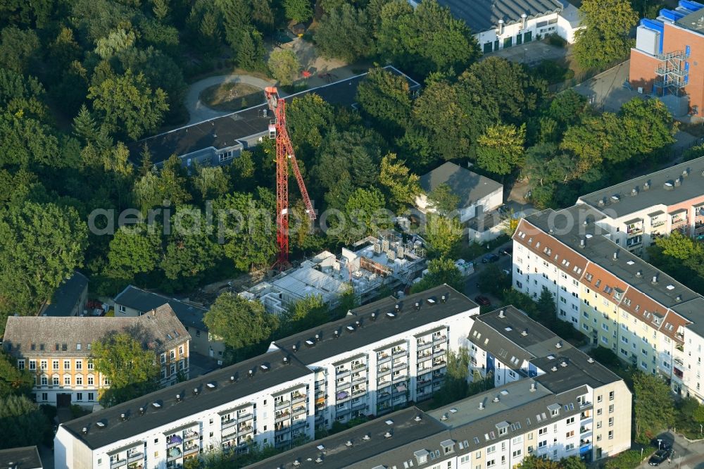 Berlin from the bird's eye view: Construction site to build a new multi-family residential complex on Landjaegerstrasse in the district Koepenick in Berlin, Germany