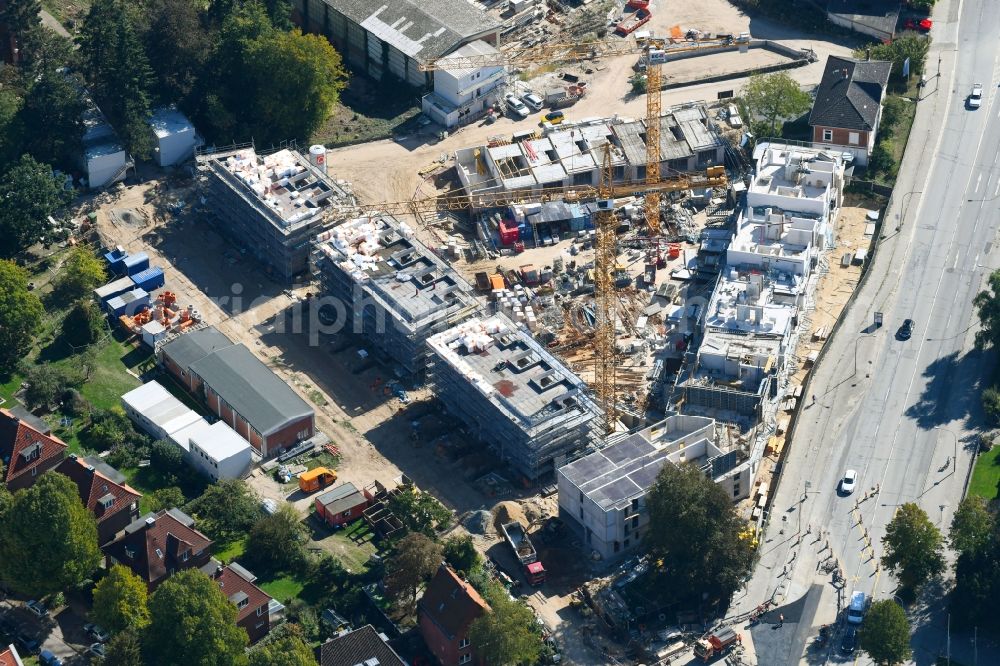 Lübeck from the bird's eye view: Construction site to build a new multi-family residential complex on Ratzeburger Allee - Zum Wasserspeicher in Luebeck in the state Schleswig-Holstein, Germany