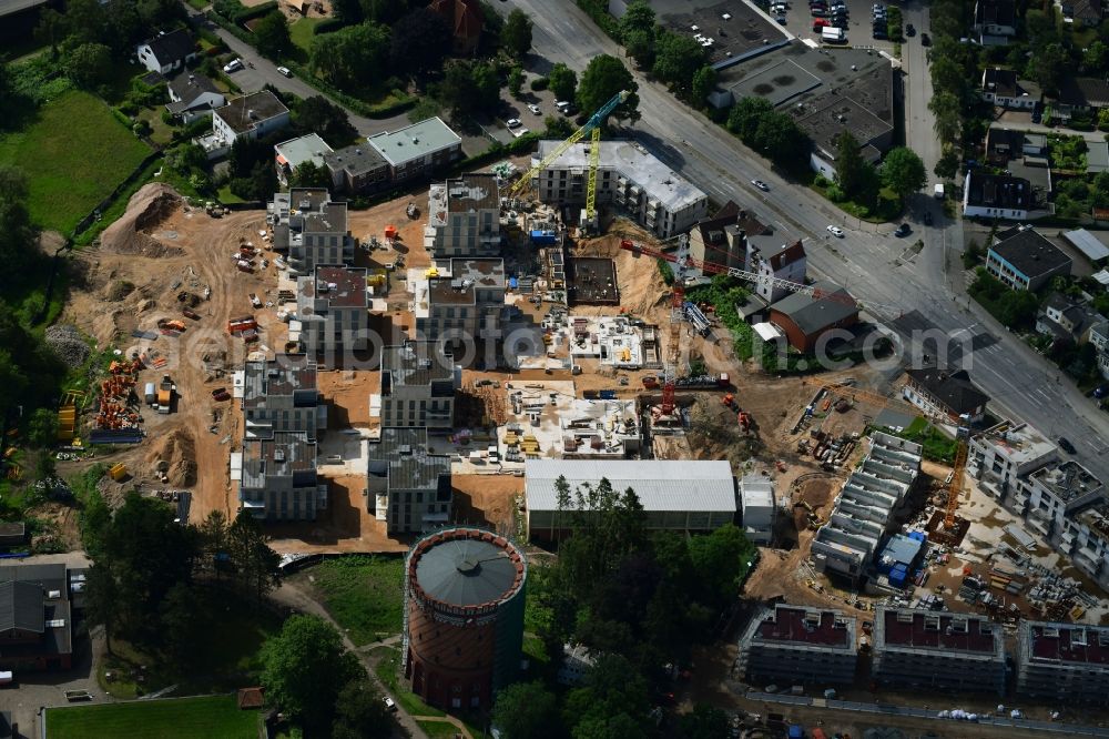 Lübeck from the bird's eye view: Construction site to build a new multi-family residential complex on Ratzeburger Allee - Zum Wasserspeicher in Luebeck in the state Schleswig-Holstein, Germany