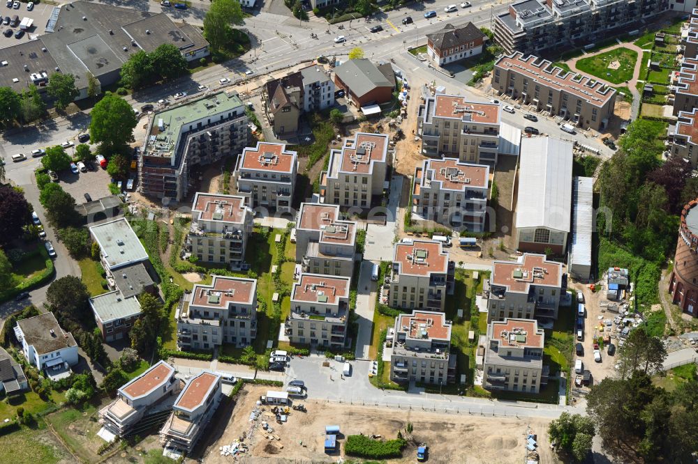 Lübeck from the bird's eye view: Construction site to build a new multi-family residential complex on Ratzeburger Allee - Zum Wasserspeicher in Luebeck in the state Schleswig-Holstein, Germany