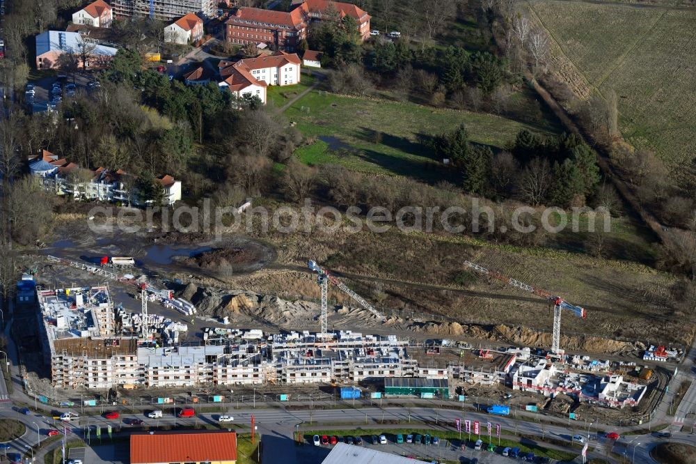 Teltow from the bird's eye view: Construction site to build a new multi-family residential complex Lichterfelder Allee corner Schoenower Strasse in Teltow in the state Brandenburg, Germany