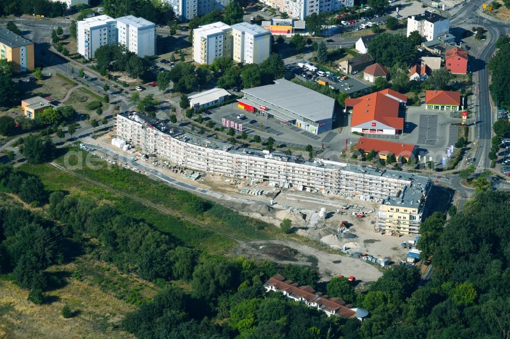 Teltow from the bird's eye view: Construction site to build a new multi-family residential complex Lichterfelder Allee corner Schoenower Strasse in Teltow in the state Brandenburg, Germany