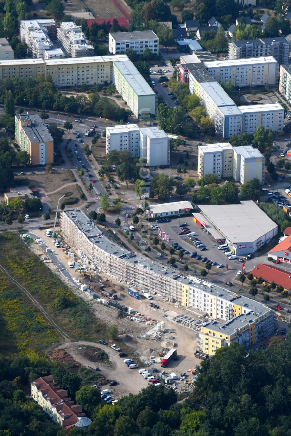 Teltow from the bird's eye view: Construction site to build a new multi-family residential complex Lichterfelder Allee corner Schoenower Strasse in Teltow in the state Brandenburg, Germany