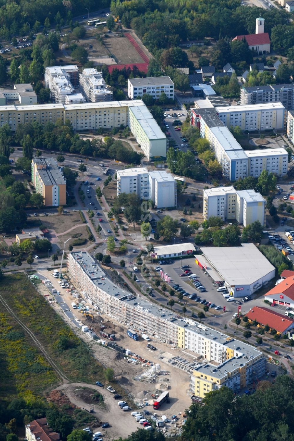 Teltow from the bird's eye view: Construction site to build a new multi-family residential complex Lichterfelder Allee corner Schoenower Strasse in Teltow in the state Brandenburg, Germany