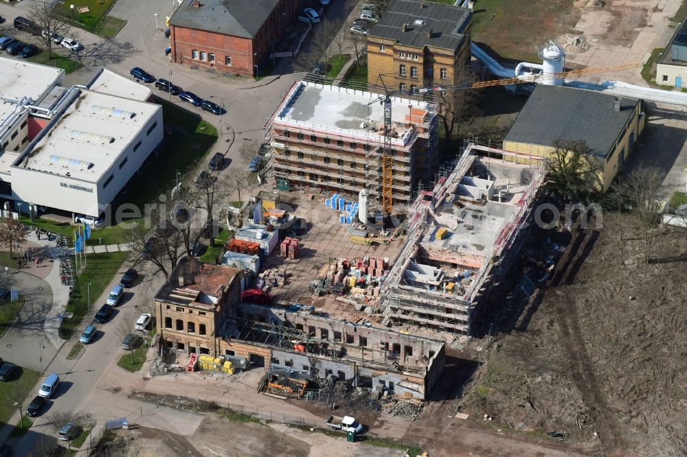 Magdeburg from the bird's eye view: Construction site to build a new multi-family residential complex Virchowquartier on Virchowstrasse in Magdeburg in the state Saxony-Anhalt, Germany