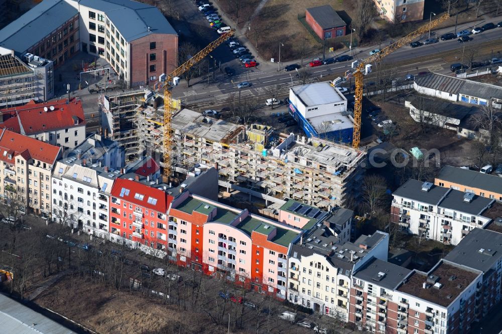 Berlin from the bird's eye view: Construction site to build a new multi-family residential complex Mahlsdorfer Strasse - Hirtenstrasse in the district Koepenick in Berlin, Germany