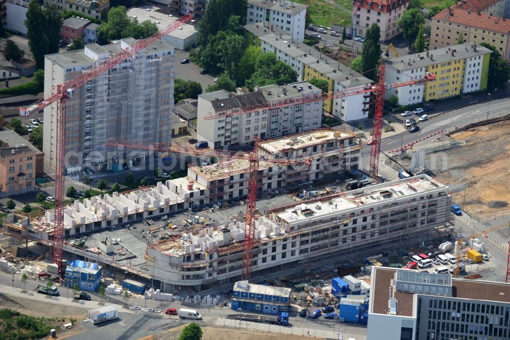 Offenbach am Main from the bird's eye view: Construction site to build a new multi-family residential complex Mainstrasse on Main- River in Offenbach am Main in the state Hesse