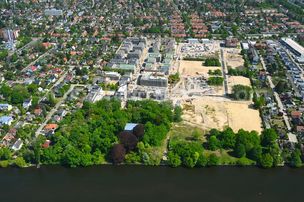 Aerial image Berlin - Construction site for the new construction of a multi-family residential complex Marienufer on the Marienhain on the banks of the river Dahme on Wendenschlossstrasse - Street An der Villa Bolle in the Koepenick district of Berlin, Germany