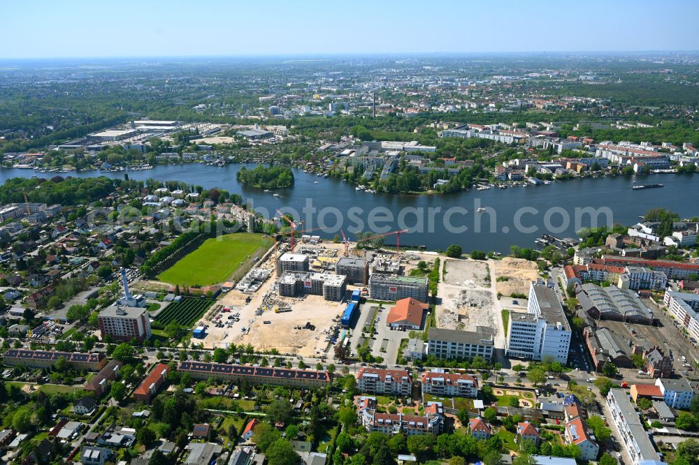 Berlin from the bird's eye view: Construction site for the new construction of a multi-family residential complex Marienufer on the Marienhain on the banks of the river Dahme on Wendenschlossstrasse - Street An der Villa Bolle in the Koepenick district of Berlin, Germany