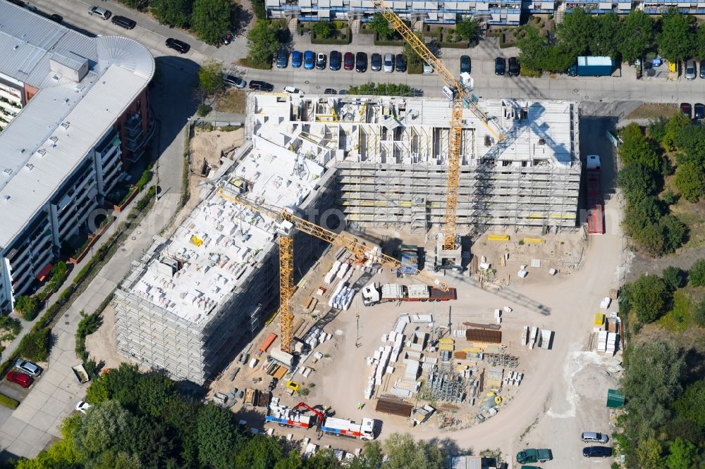 Berlin from the bird's eye view: Construction site to build a new multi-family residential complex Martin-Riesenburger-Strasse in the district Hellersdorf in Berlin, Germany