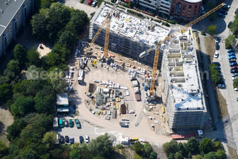 Berlin from above - Construction site to build a new multi-family residential complex Martin-Riesenburger-Strasse in the district Hellersdorf in Berlin, Germany