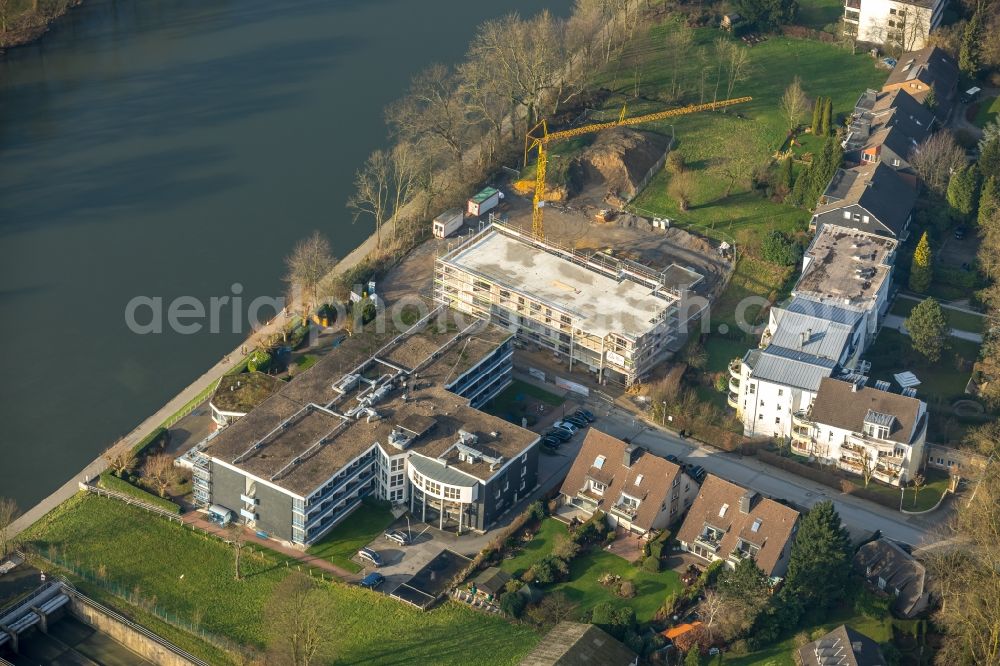 Aerial photograph Mülheim an der Ruhr - Construction site to build a new multi-family residential complex on Mendener Strasse in Muelheim on the Ruhr in the state North Rhine-Westphalia, Germany