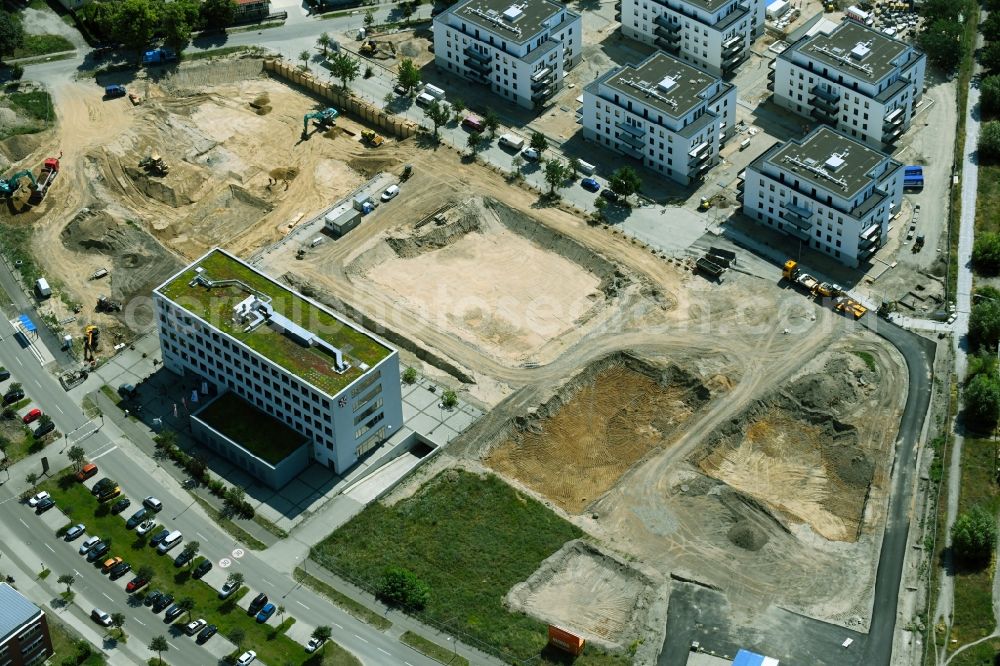 Schönefeld from the bird's eye view: Construction site to build a new multi-family residential complex Neue Mitte on Hans-Grade-Allee - Grossziethener Weg - Am Schoenefeld in Schoenefeld in the state Brandenburg, Germany