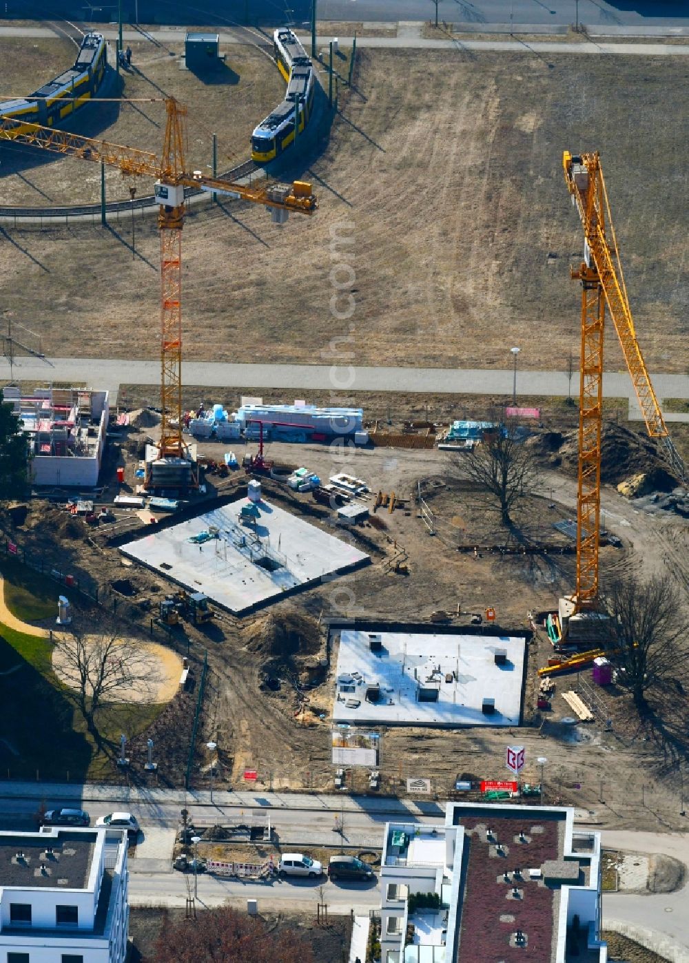 Berlin from the bird's eye view: Construction site to build a new multi-family residential complex Newtonstrasse - Alexander-von-Humboldt-Strasse in the district Johannisthal in Berlin, Germany