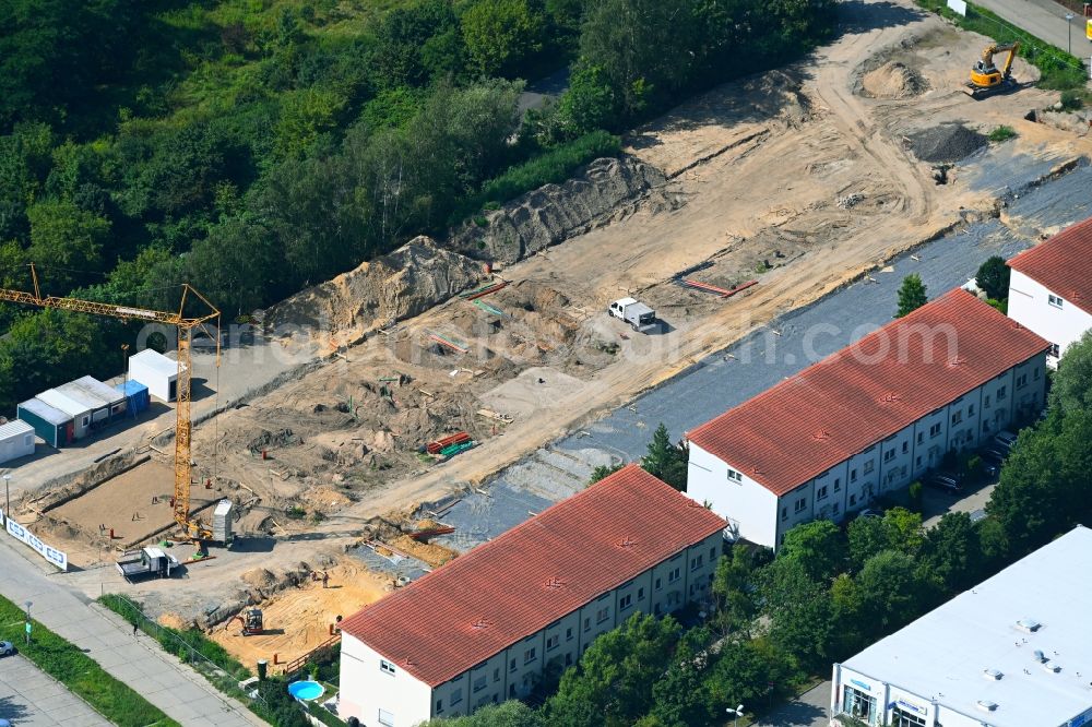 Berlin from the bird's eye view: Construction site to build a new multi-family residential complex Am Niederfeld - Rosenhagener Strasse - Hohenseeweg - Steffenshagener Strasse in the district Kaulsdorf in Berlin, Germany