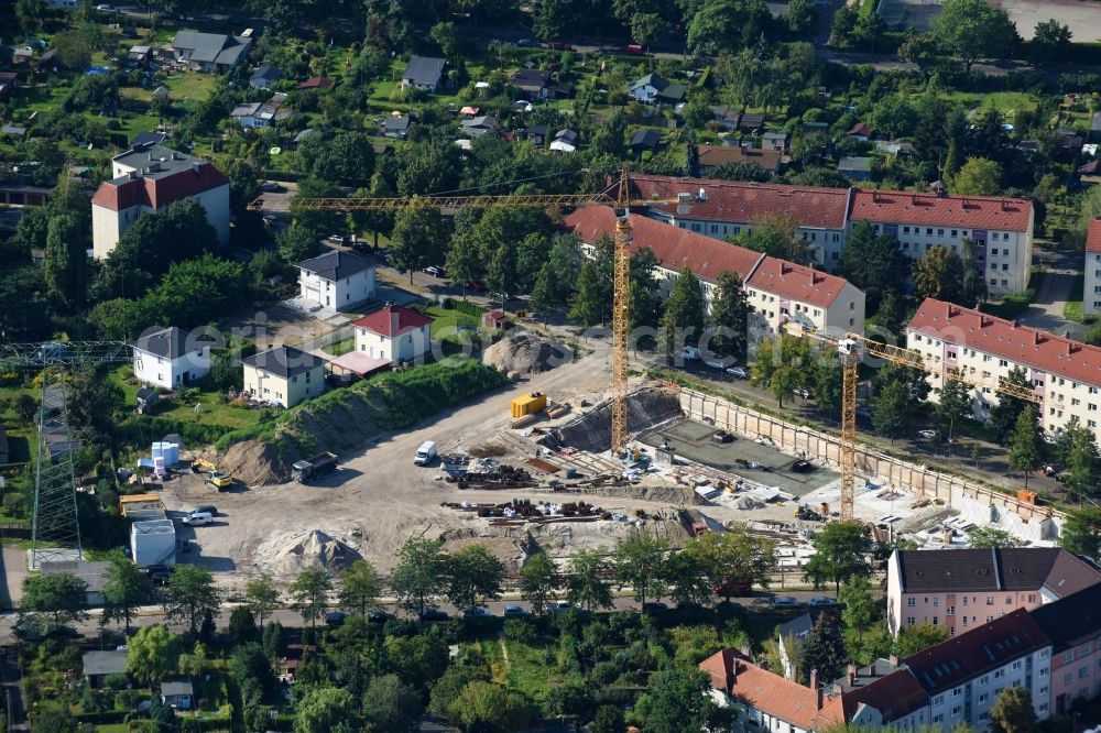 Berlin from the bird's eye view: Construction site to build a new multi-family residential complex Odinstrasse - Rienzistrasse in the district Lichtenberg in Berlin, Germany