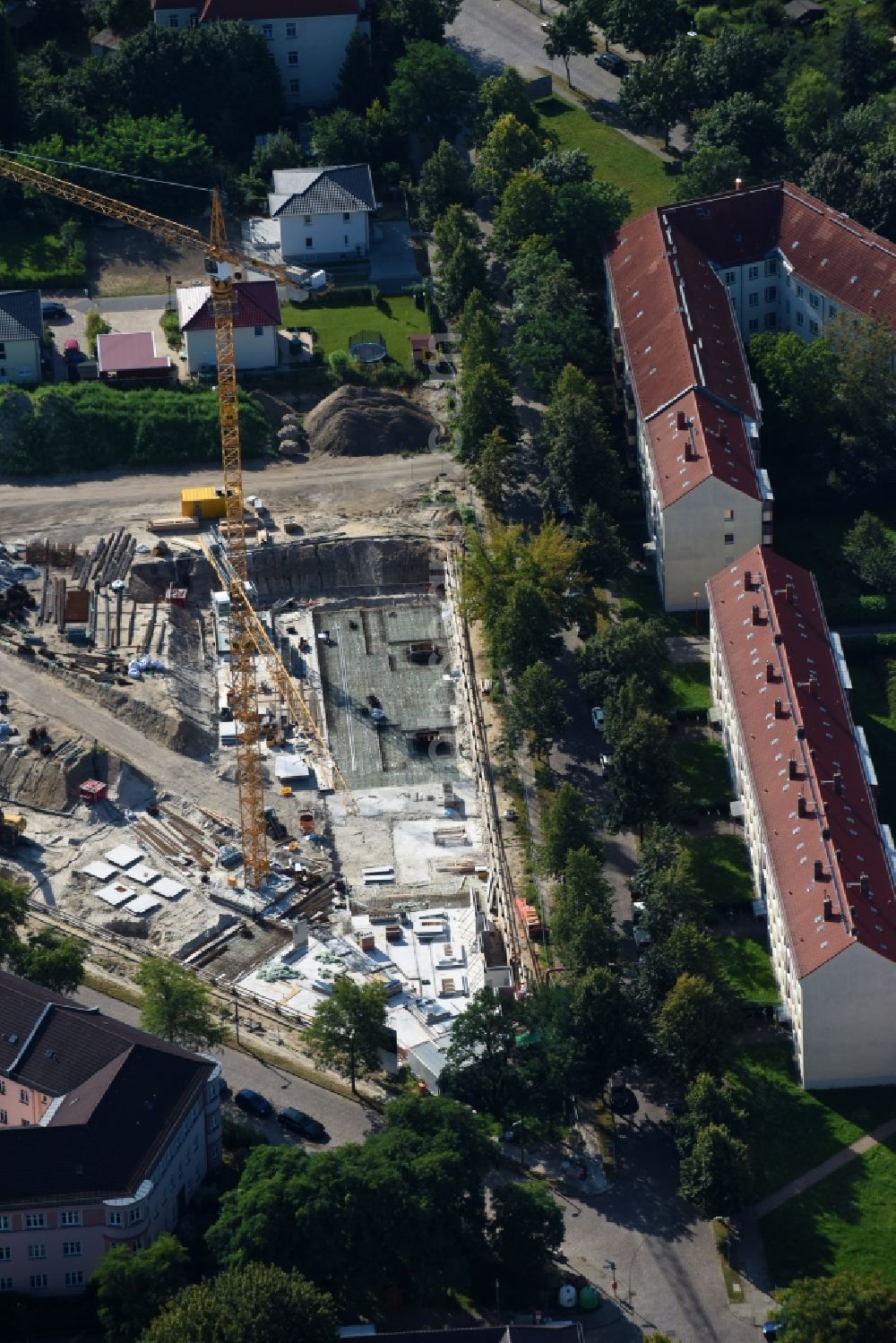 Berlin from above - Construction site to build a new multi-family residential complex Odinstrasse - Rienzistrasse in the district Lichtenberg in Berlin, Germany