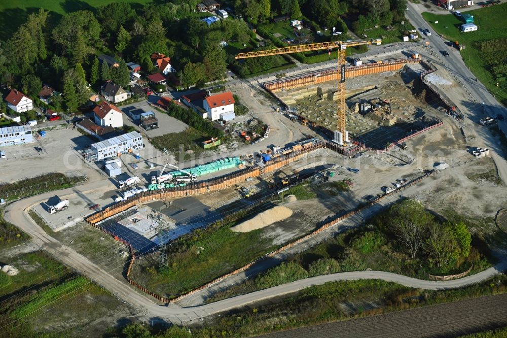 München from above - Construction site to build a new multi-family residential complex in the district Aubing-Lochhausen in Munich in the state Bavaria, Germany