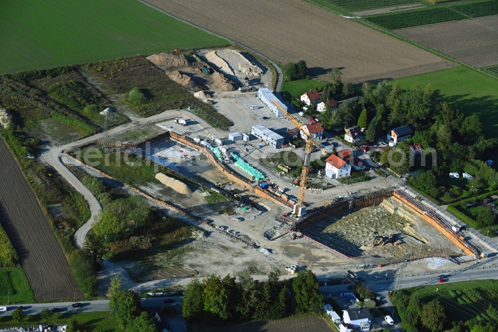 München from above - Construction site to build a new multi-family residential complex in the district Aubing-Lochhausen in Munich in the state Bavaria, Germany