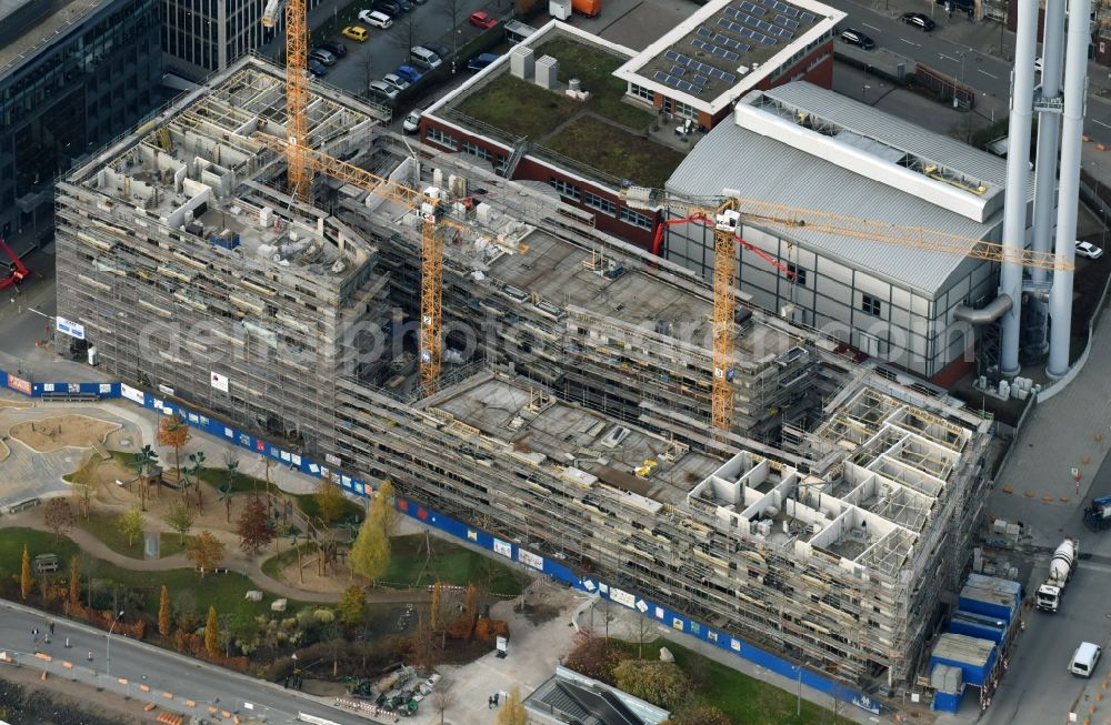 Hamburg from the bird's eye view: Construction site to build a new multi-family residential complex Am Grasbrookpark - San-Francisco-Strasse in the district Hafencity in Hamburg