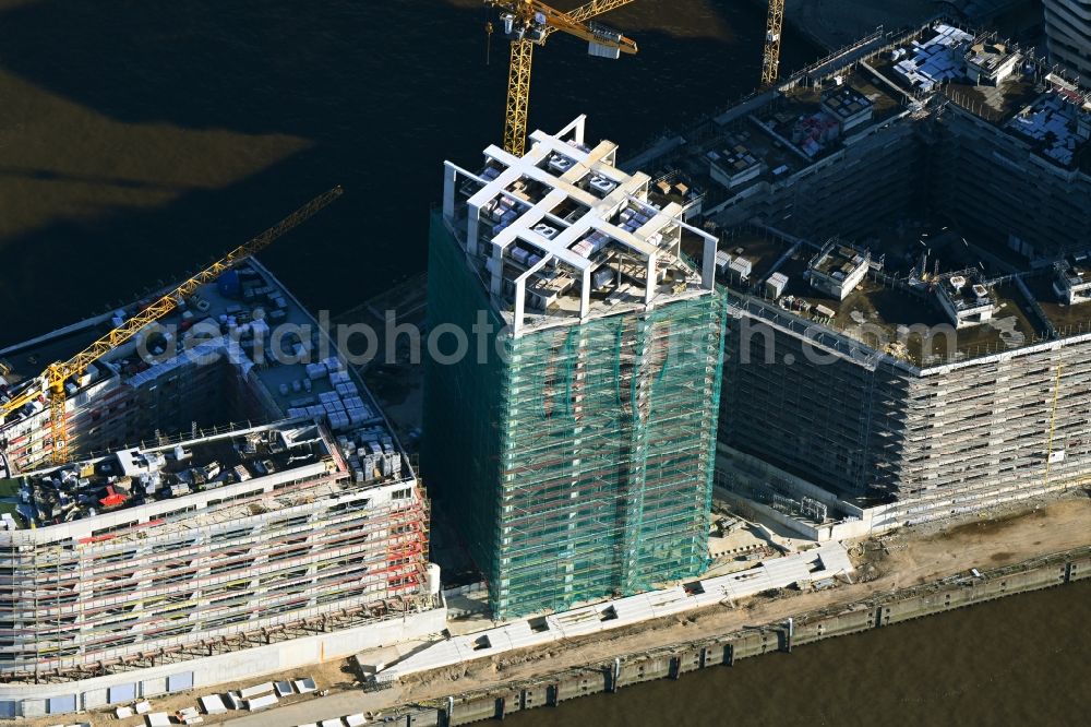 Aerial photograph Hamburg - Construction site to build a new multi-family residential complex of DC DEVELOPMENTS GMBH & CO. KG on Strandkai along the Nordelbe in the district HafenCity in Hamburg, Germany