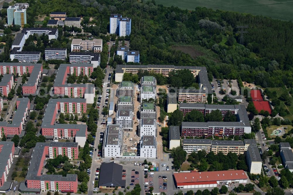 Berlin from above - Construction site to build a new multi-family residential complex along the Tangermuender Strasse in the district Hellersdorf in Berlin, Germany