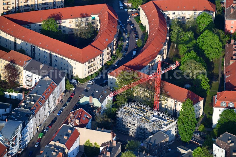 Berlin from the bird's eye view: Construction site to build a new multi-family residential complex on Weinbergstrasse in the district Koepenick in Berlin, Germany