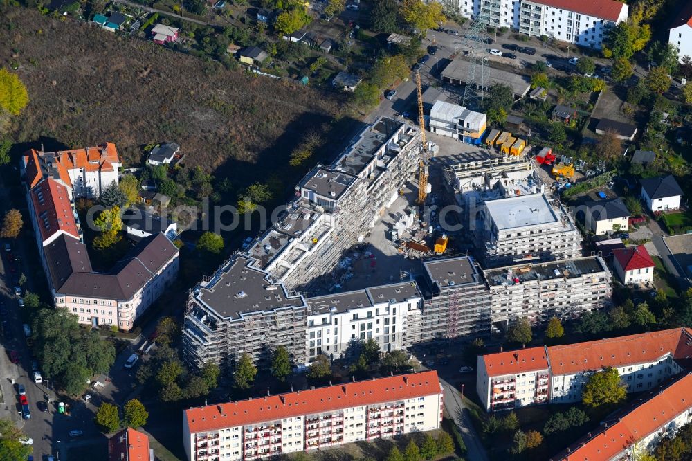 Berlin from the bird's eye view: Construction site to build a new multi-family residential complex Odinstrasse - Rienzistrasse in the district Lichtenberg in Berlin, Germany