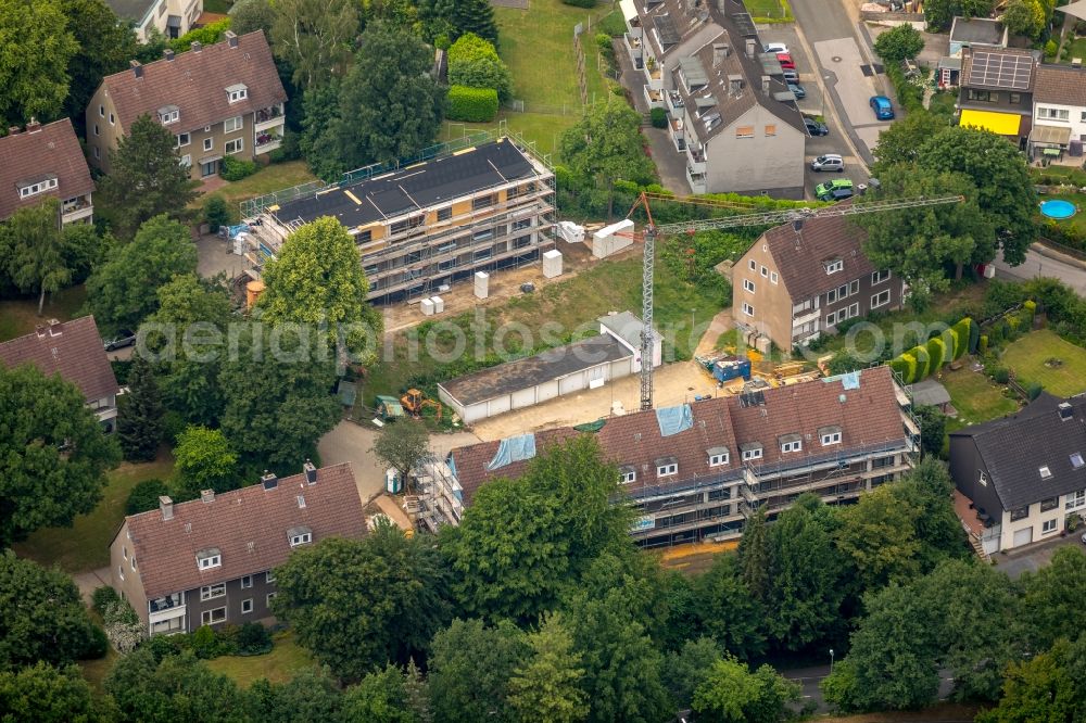 Niederwenigern from the bird's eye view: Construction site to build a new multi-family residential complex Im Eickhof in the district Niederwenigern in Hattingen in the state North Rhine-Westphalia, Germany