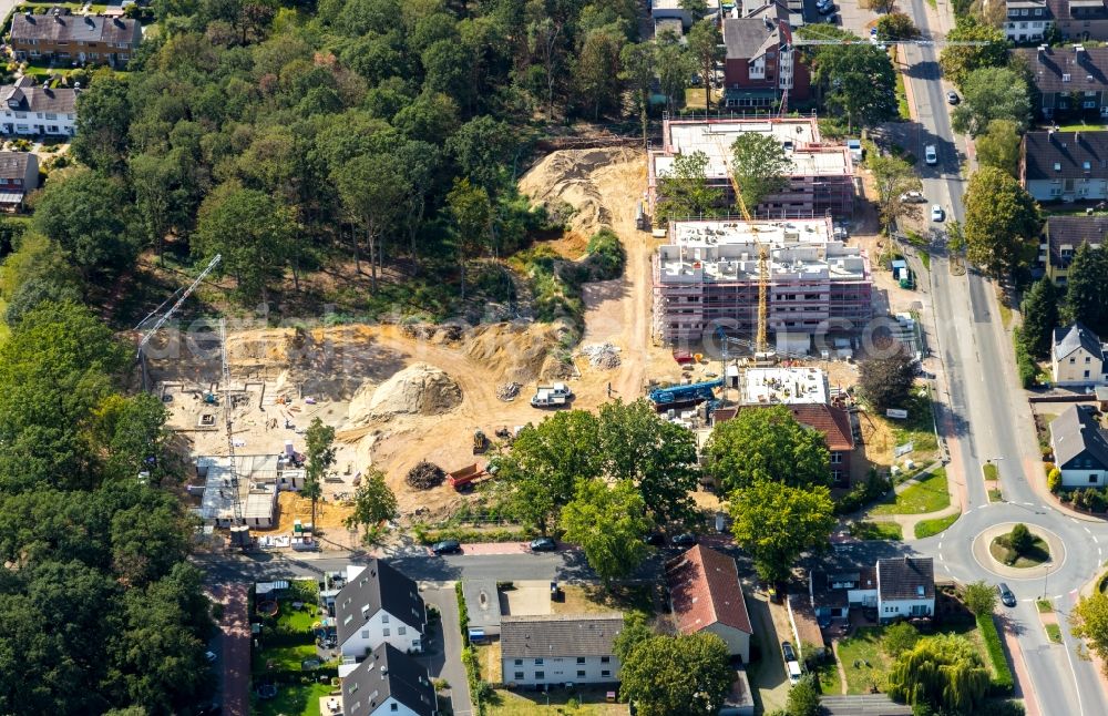 Aerial image Voerde (Niederrhein) - Construction site to build a new multi-family residential complex Pestalozziquartier on Alexanderstrasse - Bahnhofstrasse in Voerde (Niederrhein) in the state North Rhine-Westphalia, Germany