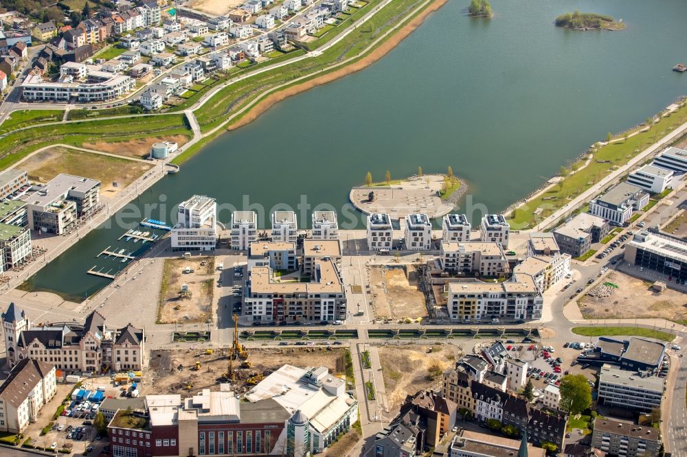 Dortmund from above - Construction site for construction of a multi-family house residential area at Phoenix Lake other Hoerder Brook Parkway in Dortmund in North Rhine-Westphalia. Links the Specialists Zentum at Phoenix Lake (FAPS)