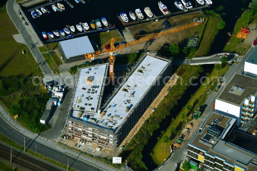 Rostock from above - Construction site to build a new multi-family residential complex PIER48 Bei of Petribleiche in Rostock in the state Mecklenburg - Western Pomerania, Germany