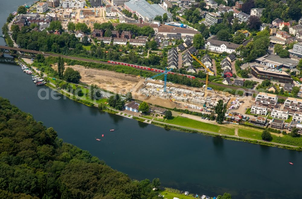 Essen from the bird's eye view: Construction site to build a new multi-family residential complex Promenadenweg on river banks of Ruhr in the district Kettwig in Essen in the state North Rhine-Westphalia