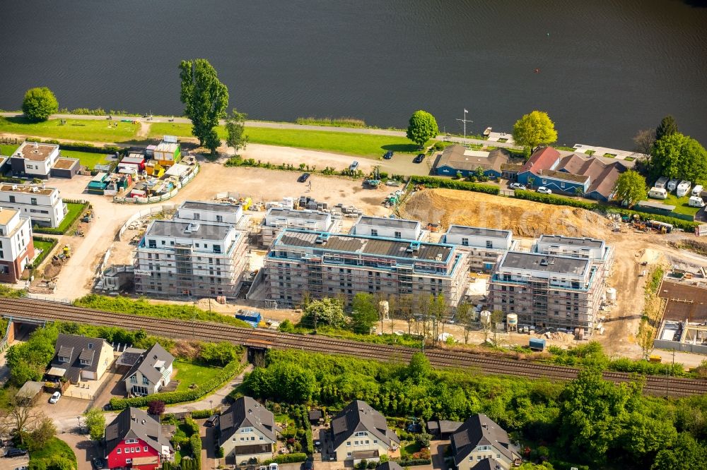 Essen from the bird's eye view: Construction site to build a new multi-family residential complex Promenadenweg on river banks of Ruhr in the district Kettwig in Essen in the state North Rhine-Westphalia