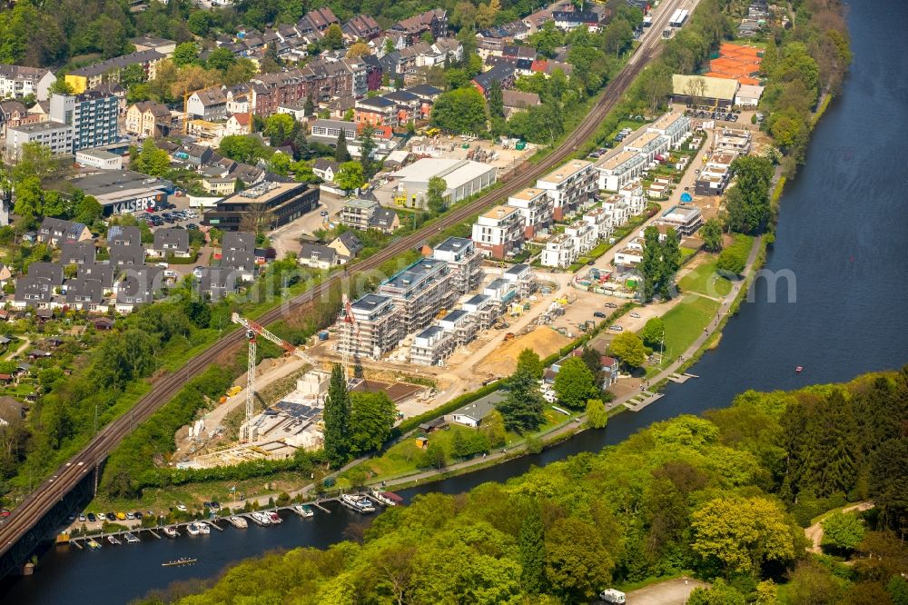 Essen from the bird's eye view: Construction site to build a new multi-family residential complex Promenadenweg on river banks of Ruhr in the district Kettwig in Essen in the state North Rhine-Westphalia