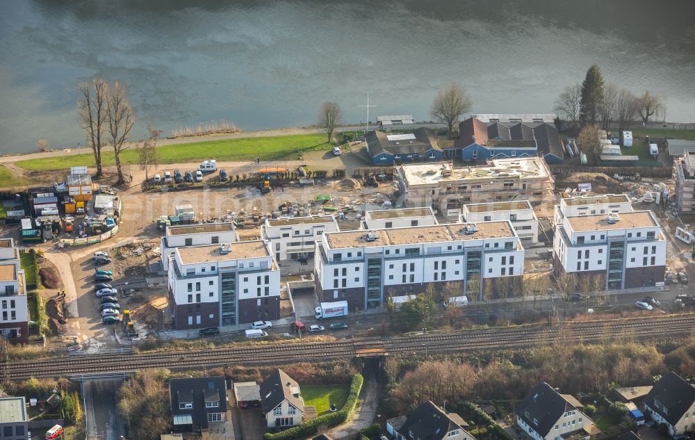 Essen from the bird's eye view: Construction site to build a new multi-family residential complex Promenadenweg on river banks of Ruhr in the district Kettwig in Essen in the state North Rhine-Westphalia