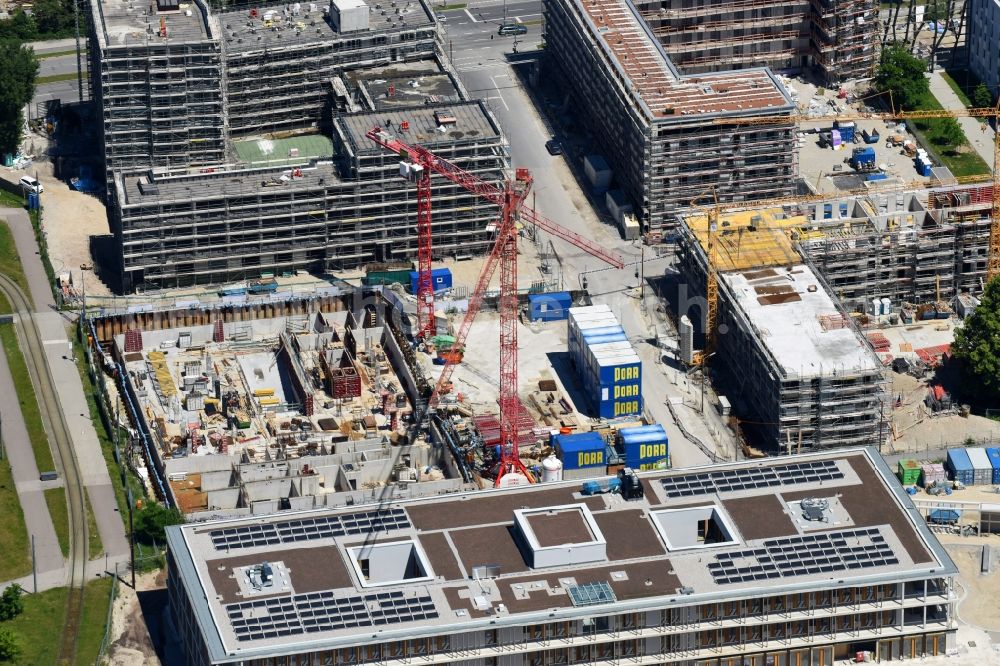 München from the bird's eye view: Construction site to build a new multi-family residential complex Quarter City II on Quarter City II - Bauhausplatz in Domagkpark in the district Schwabing-Freimann in Munich in the state Bavaria, Germany