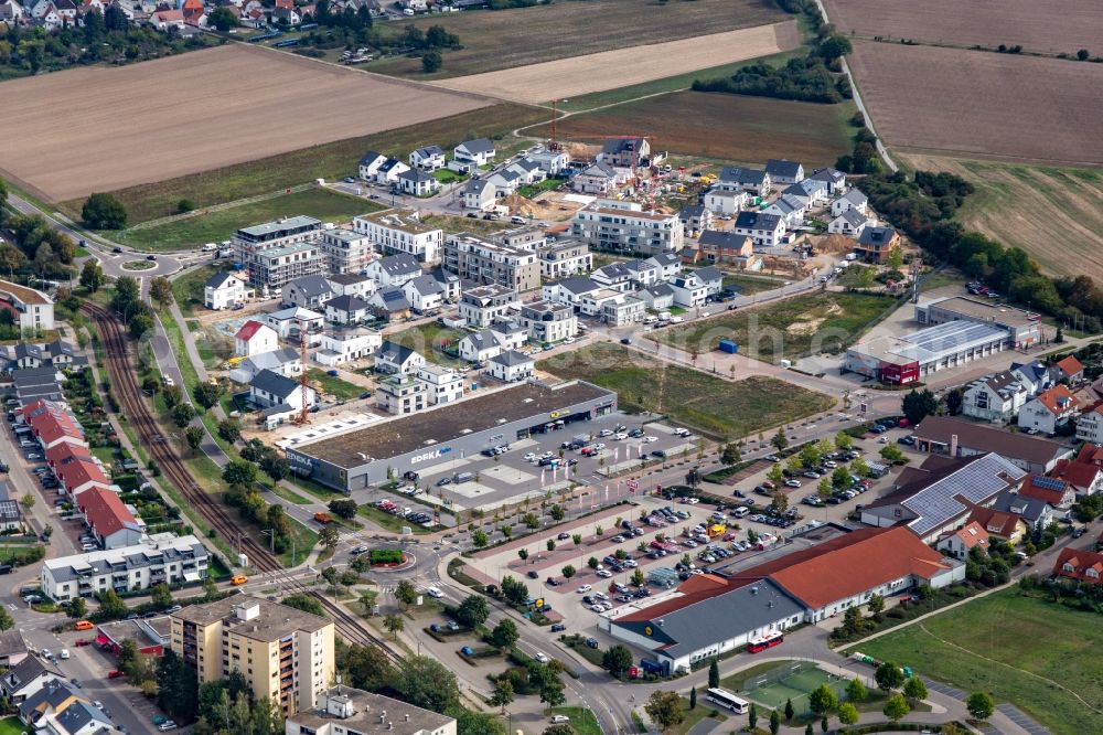 Hochstetten from the bird's eye view: Construction site to build a new multi-family residential complex Quartier 2020 development area Biegen-Durlacher Weg in Hochstetten in the state Baden-Wuerttemberg, Germany