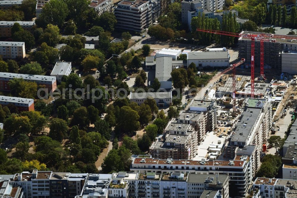 Berlin from above - Construction site to build a new multi-family residential complex Quartier Luisenpark on Stallschreiberstrasse - Alexandrinenstrasse in the district Mitte in Berlin, Germany