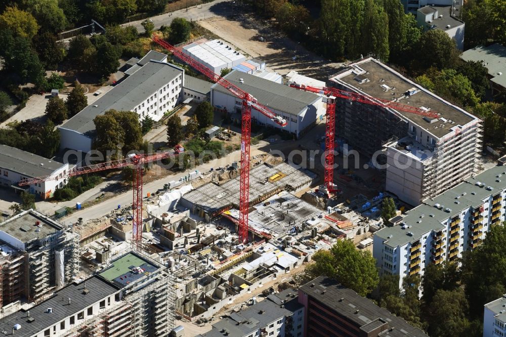 Berlin from the bird's eye view: Construction site to build a new multi-family residential complex Quartier Luisenpark on Stallschreiberstrasse - Alexandrinenstrasse in the district Mitte in Berlin, Germany