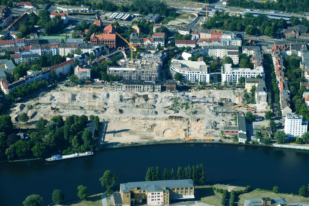 Aerial image Berlin - Construction site to build a new multi-family residential complex Fliessstrasse - Hasselwerder Strasse on river Spree in the district Schoeneweide in Berlin, Germany