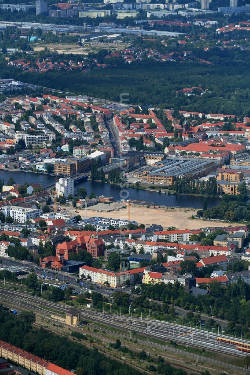 Berlin from above - Construction site to build a new multi-family residential complex Fliessstrasse - Hasselwerder Strasse on river Spree in the district Schoeneweide in Berlin, Germany