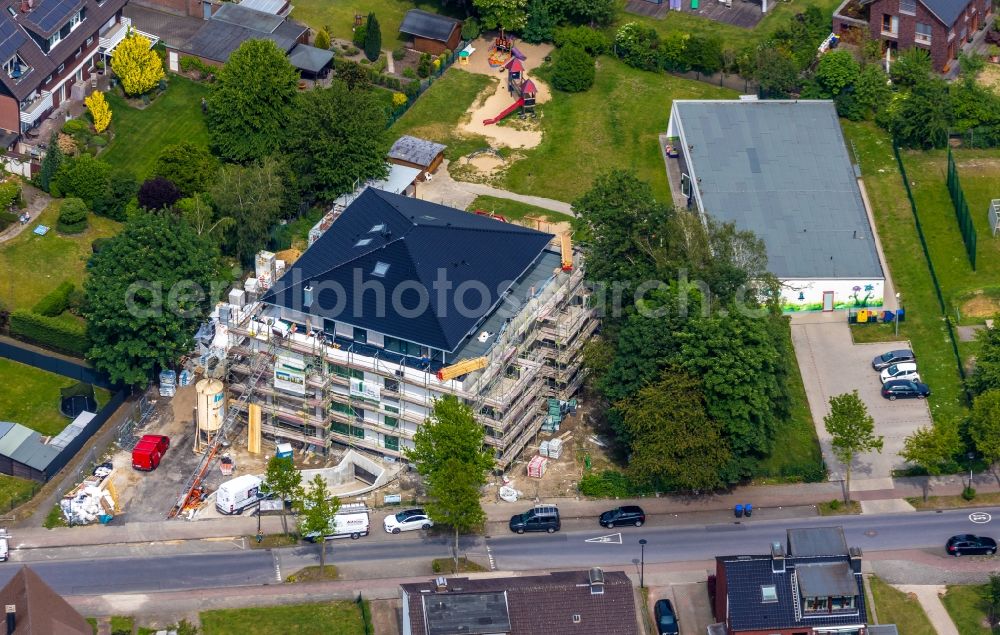 Werne from the bird's eye view: Construction site to build a new multi-family residential complex Reale Werte eG Wohnungs- and Baugenossenschaft in Werne in the state North Rhine-Westphalia, Germany