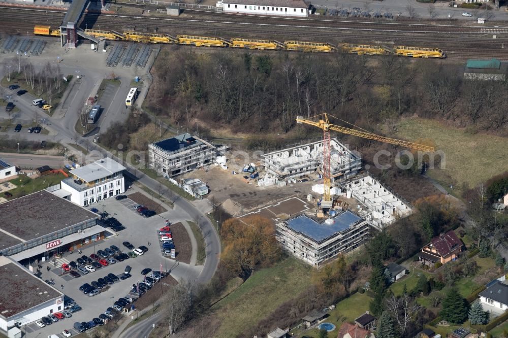 Fredersdorf-Vogelsdorf from above - Construction site to build a new multi-family residential complex Refugium am Muehlenfliess an der Brueckenstrasse in Fredersdorf-Vogelsdorf in the state Brandenburg